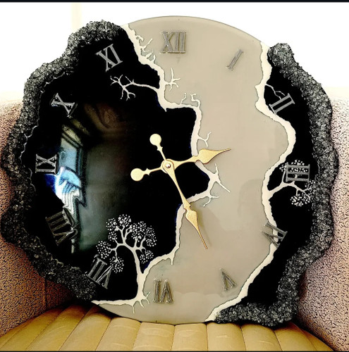 ساعت رزینی طرح دفرمه